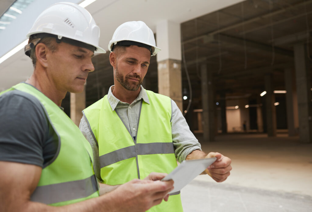 Two Professionals Discussing the Construction Plan